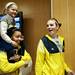 Four-year-old Cece Arico rides on the shoulders of a Michigan basketball player on Monday, March 18. Daniel Brenner I AnnArbor.com